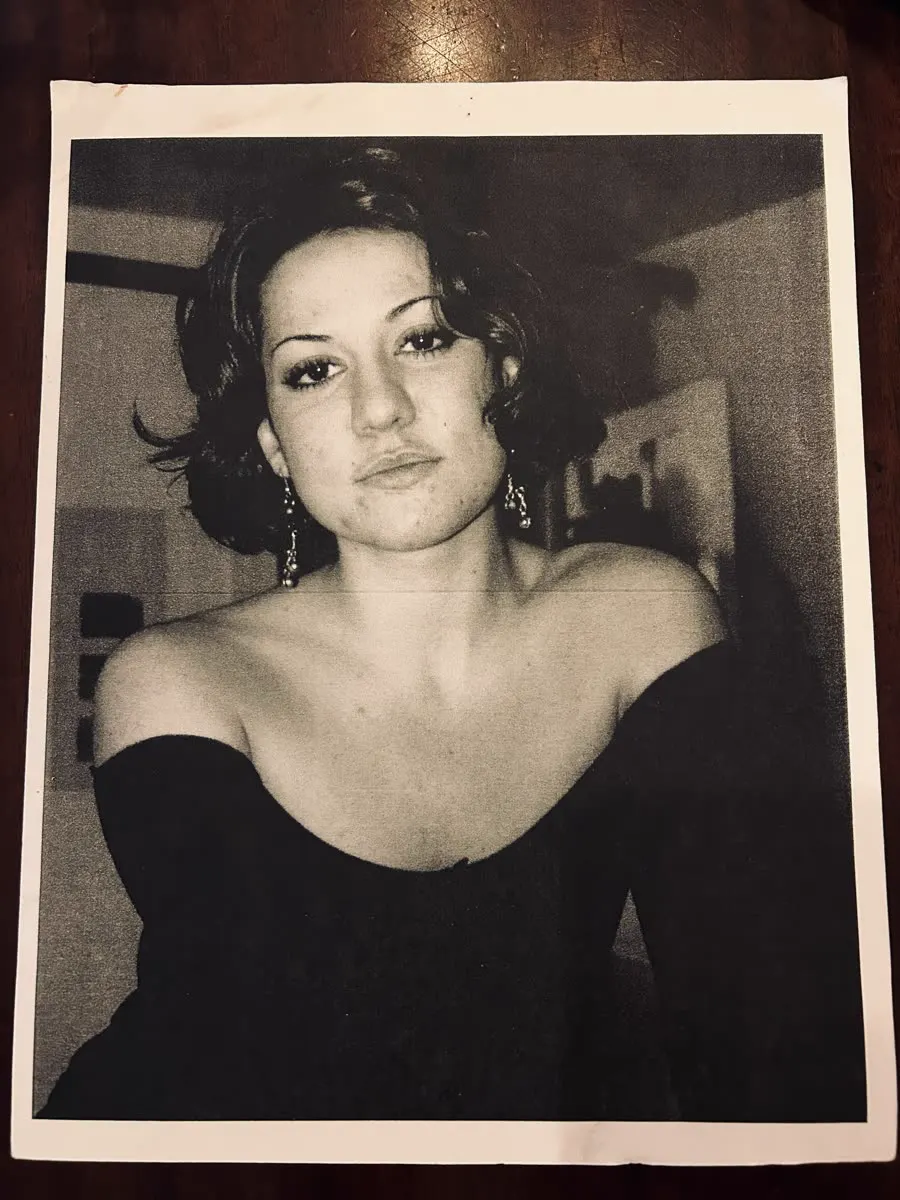 Black and white print of a portrait of a young woman